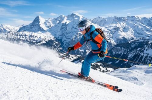 Skier carving down a snowy mountain slope — complete guide to calories burned skiing