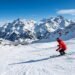 Aerial view of Engelberg Switzerland ski resort with Titlis glacier and snowy alpine peaks